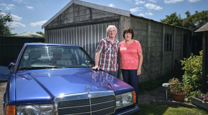 Classic Vehicle Group couple with Mercedes car